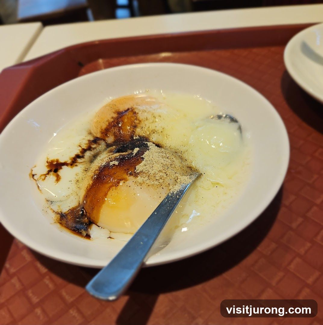 Soft-boiled eggs with soy sauce and pepper