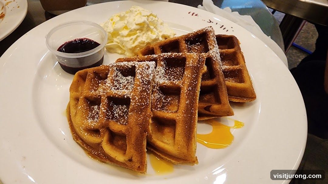 Waffles with Whipped Cream and Berry Compote