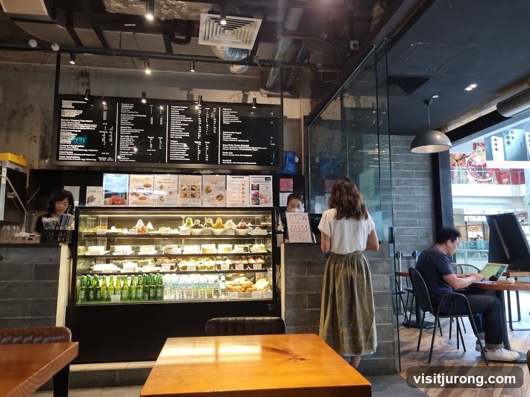 Cafe Interior with Desserts and Menu