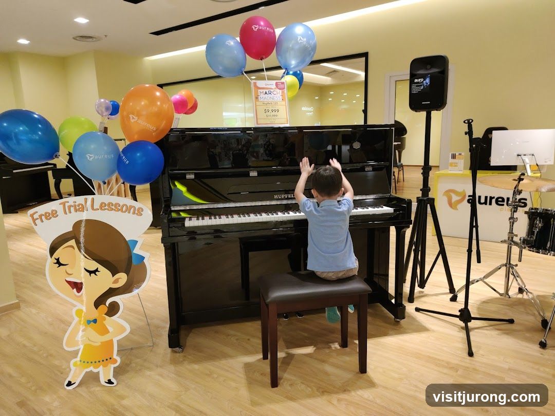 Child playing piano with balloons
