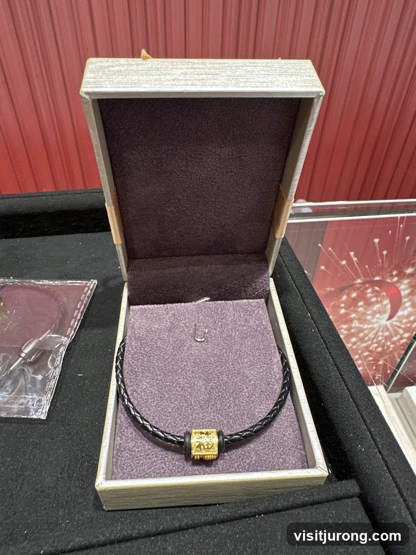 Gold pendant necklace in a box