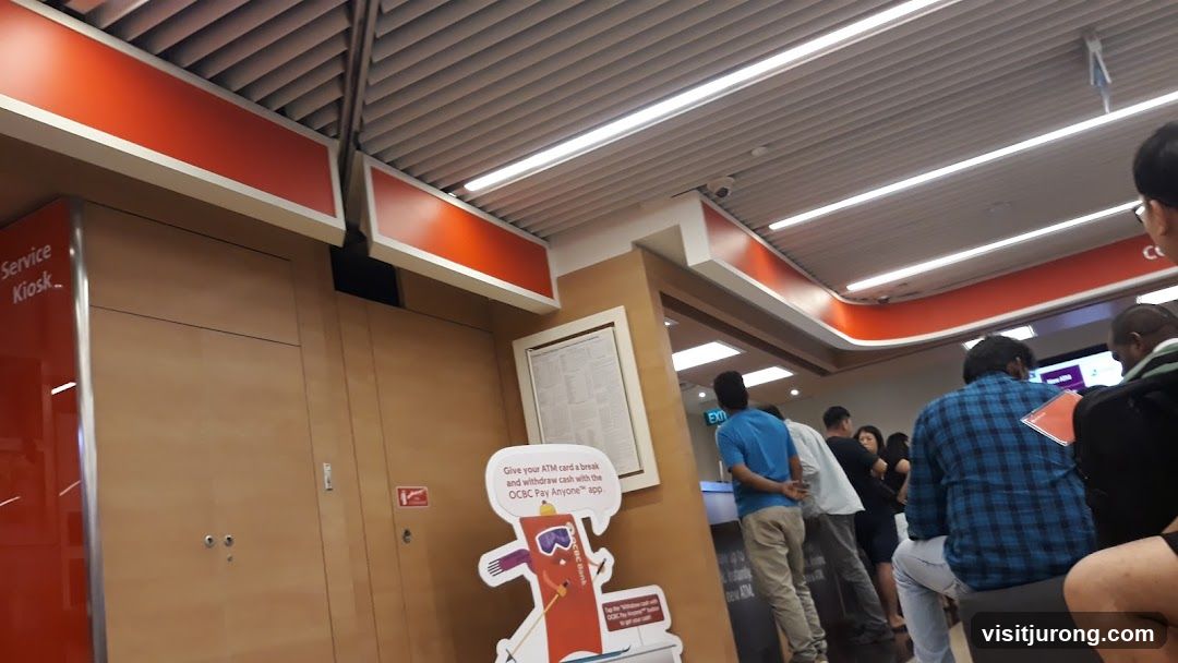 Bank Interior with Service Kiosk and ATM Promotion