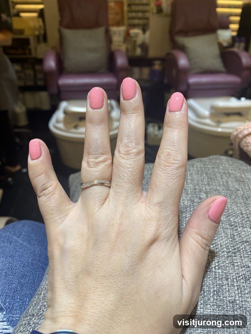 Manicured Hand with Pink Polish