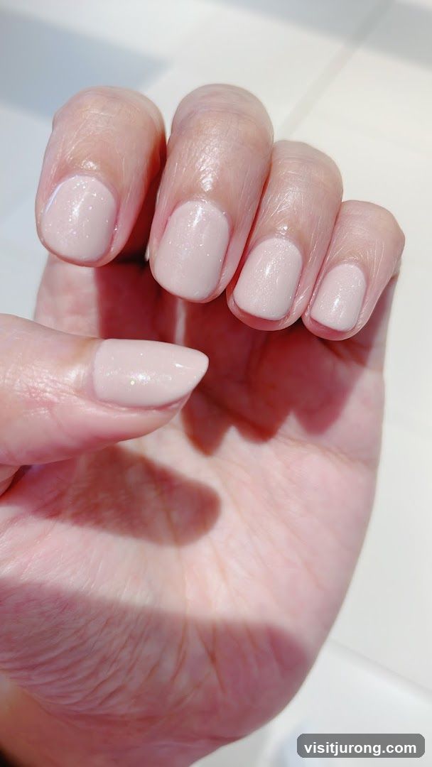 Nails with light pink polish