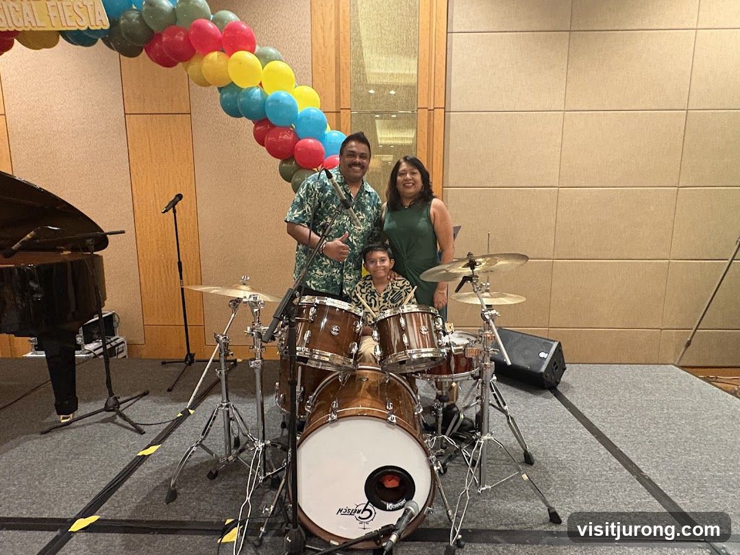 Family Poses with Drum Set at Musical Fiesta