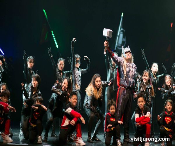 Performers in Superhero and Catwoman Costumes