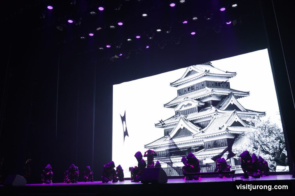 Stage Performance with Japanese Castle Backdrop