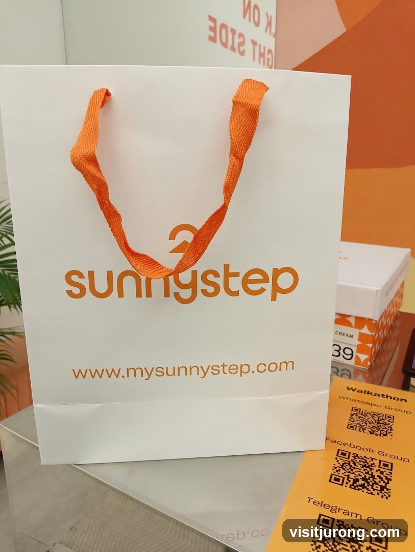 Shopping bag with company logo and website