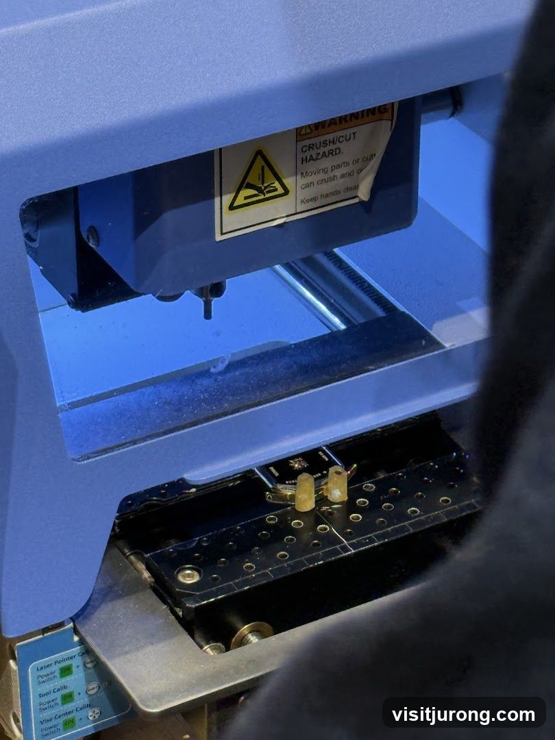 Close-up of a machine with a warning label
