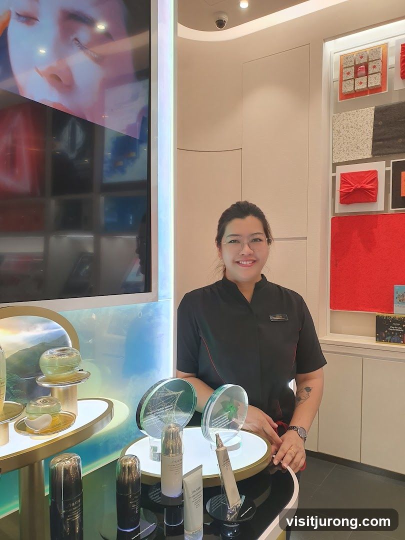 Cosmetics display with staff member
