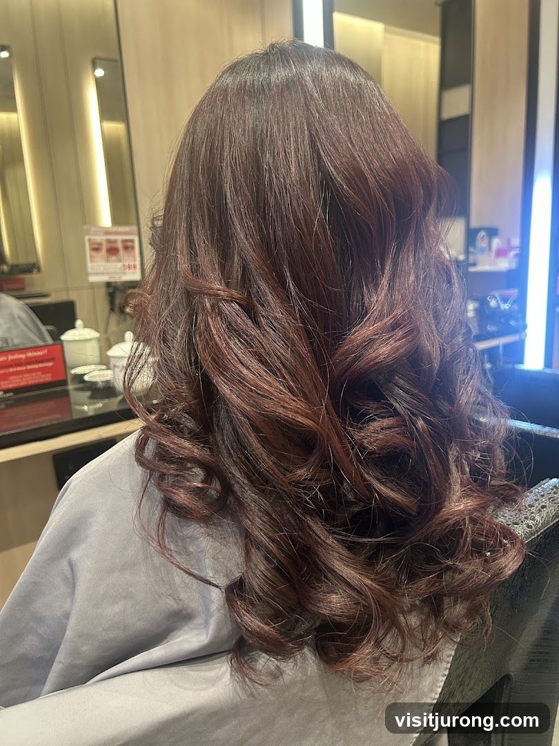 Woman with styled auburn hair