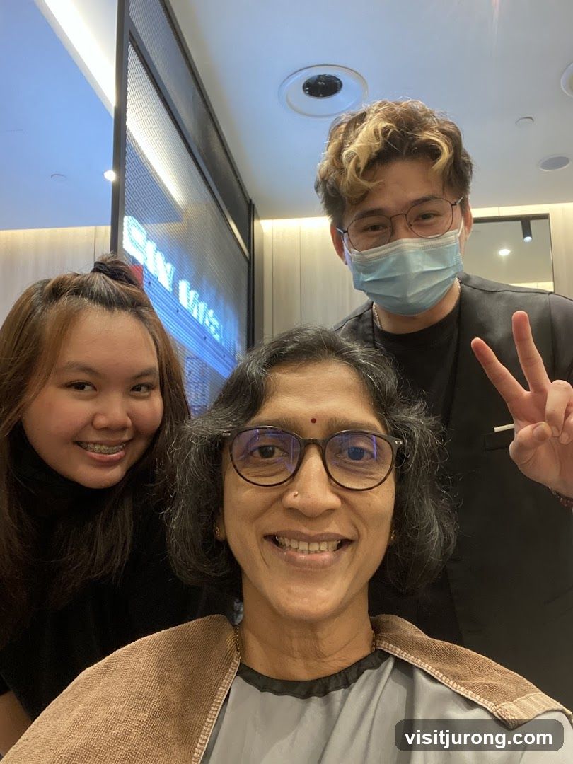 Three people smiling for a selfie
