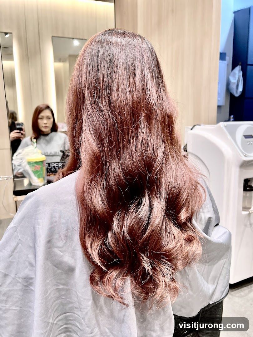 Woman with Rose Gold Hair in Salon