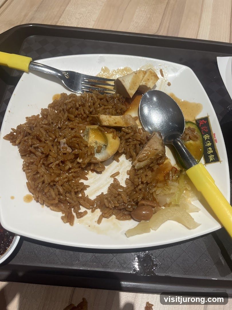Plate of food with rice and meat