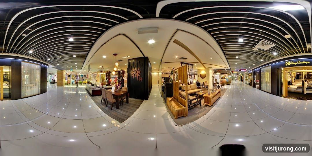 Interior of a shopping mall with various stores
