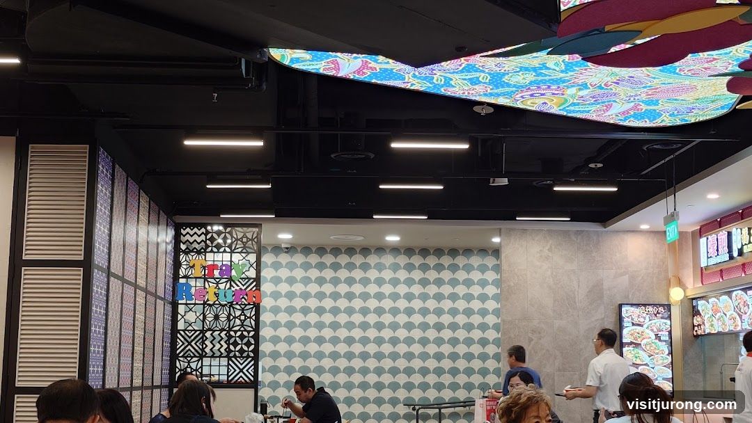 Food court interior with decorative ceiling and walls