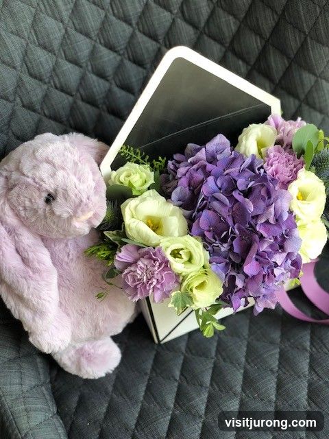 Floral Arrangement with Plush Toy