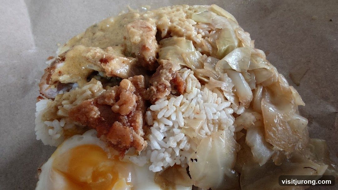 Rice dish with fried chicken and egg