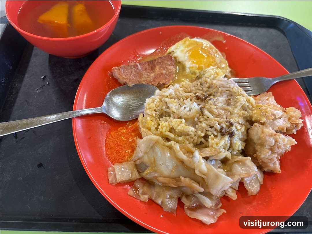 Rice dish with fried chicken and egg