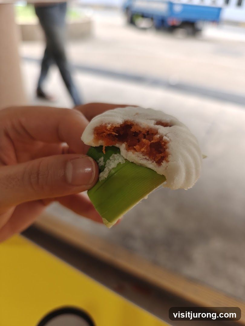 Close-up of a steamed bun with filling
