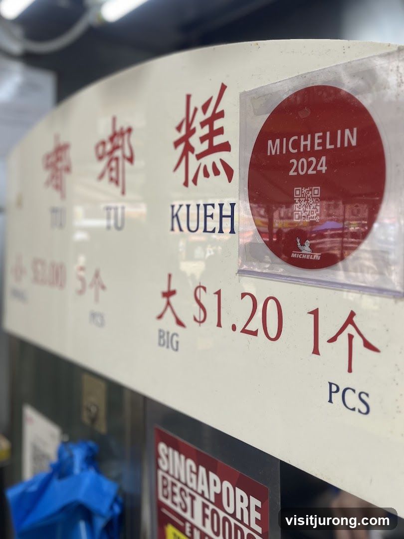 Menu board with prices and Michelin sticker