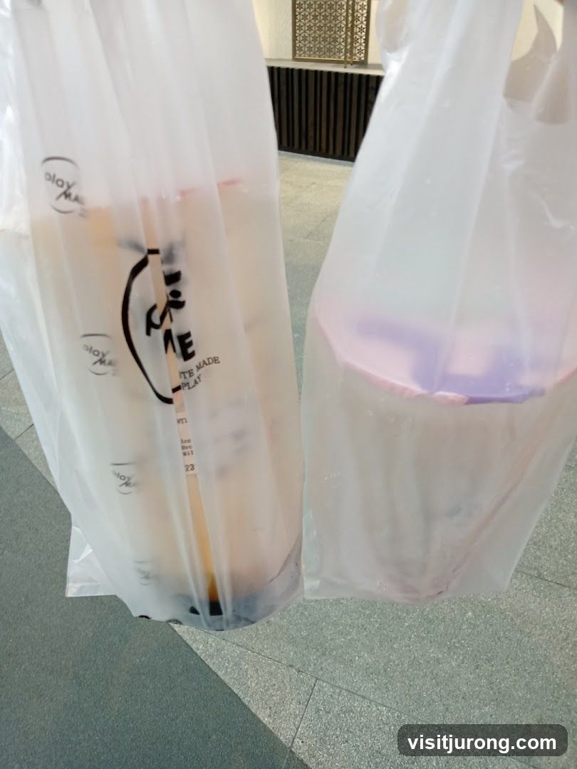 Two drinks in plastic bags