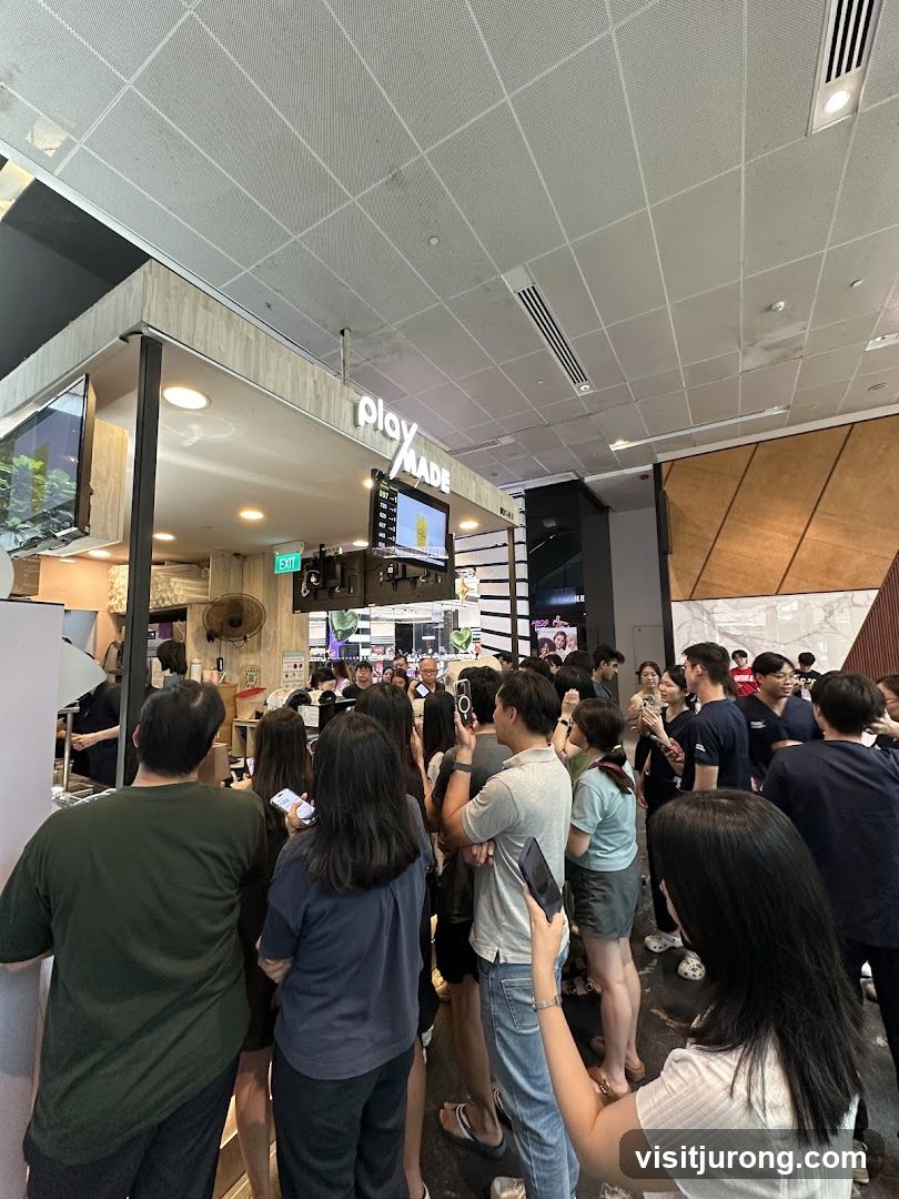 People queuing at a food stall