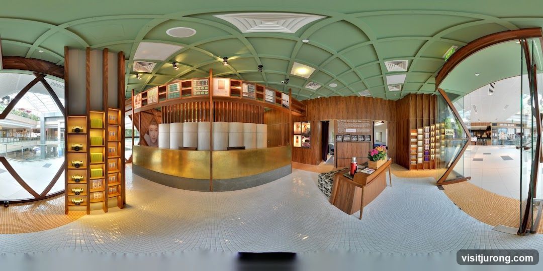 Interior of a store with wooden accents and green ceiling