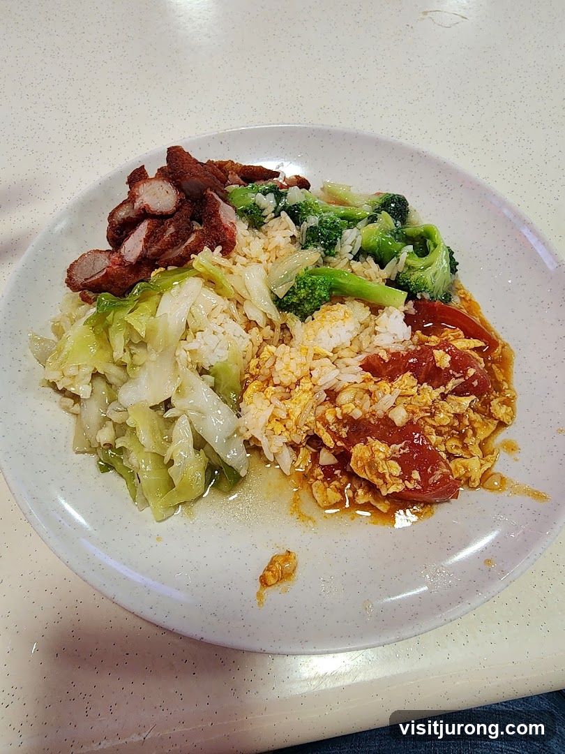 Plate of food with rice and various toppings