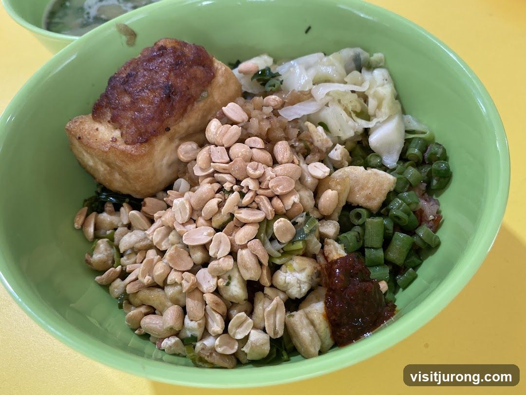 Bowl of Food with Peanuts and Vegetables
