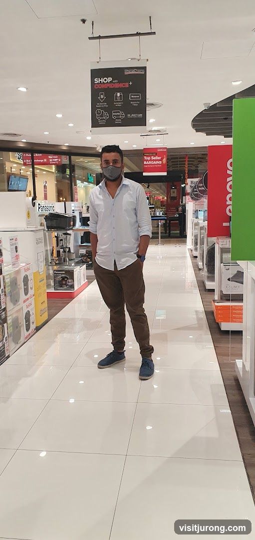 Man in Electronics Store