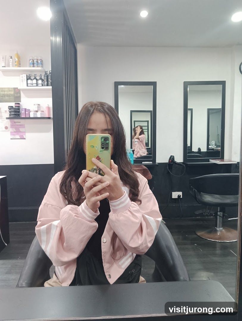 Woman taking a selfie in a salon