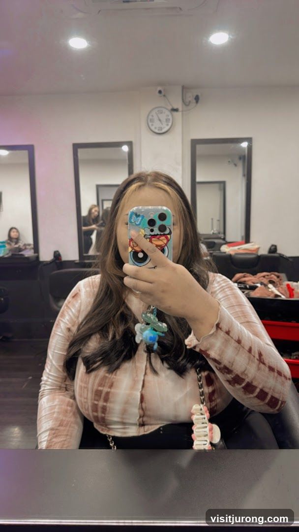 Woman taking a selfie in a salon