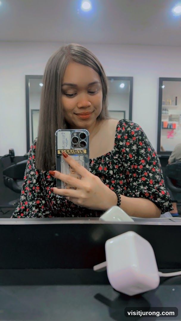 Woman taking a selfie in a salon