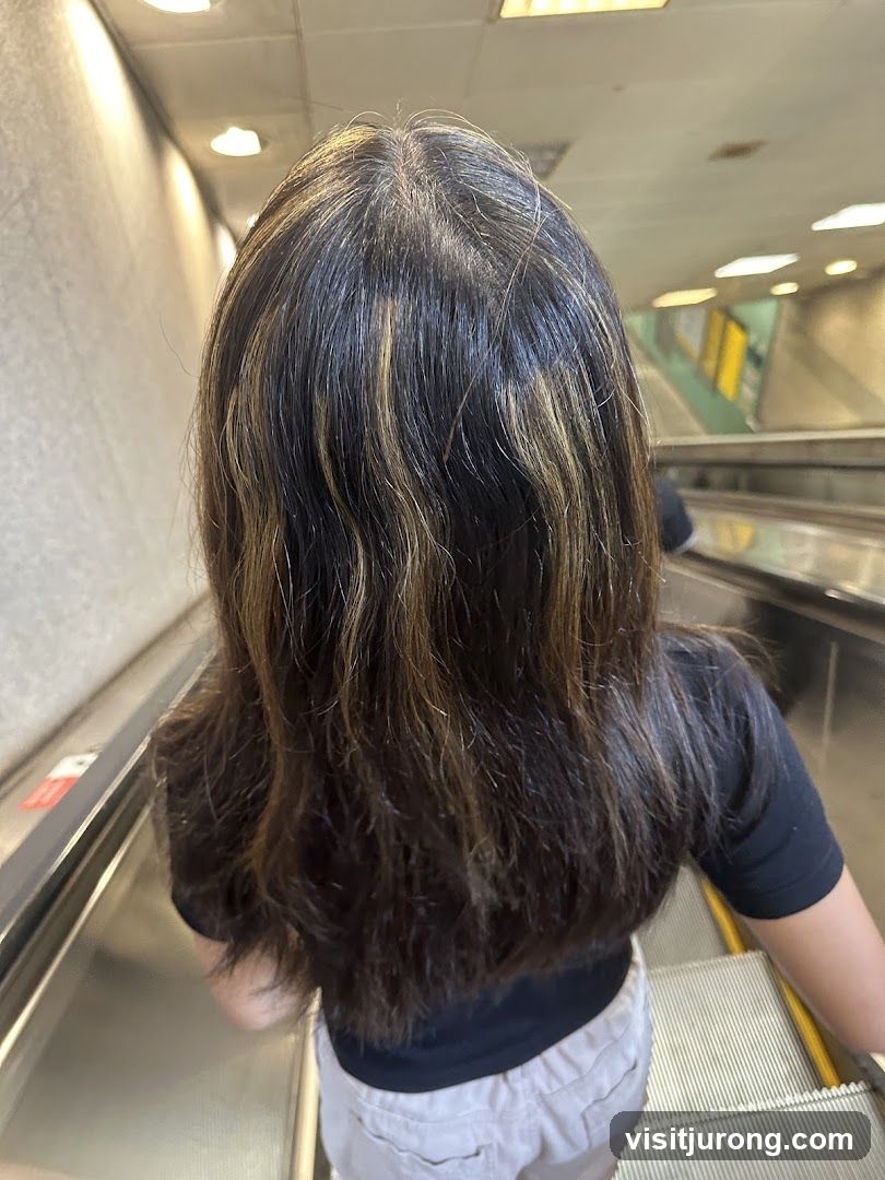 Woman on Escalator
