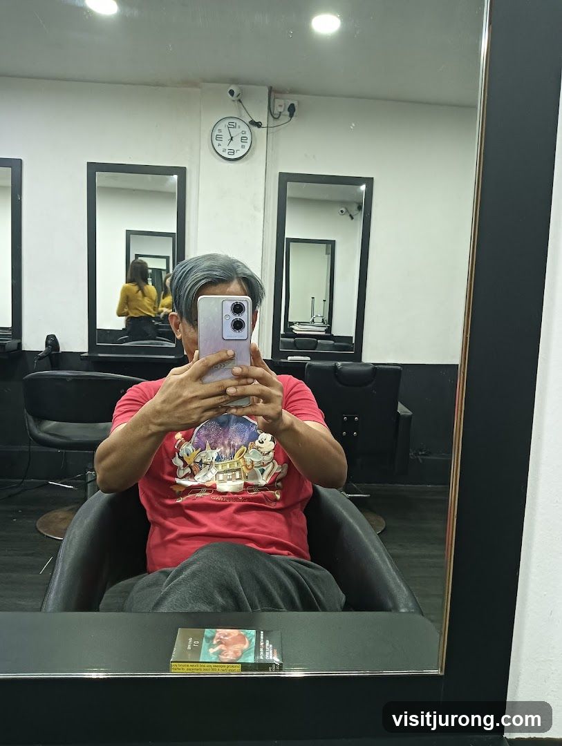 Man taking a selfie in a salon