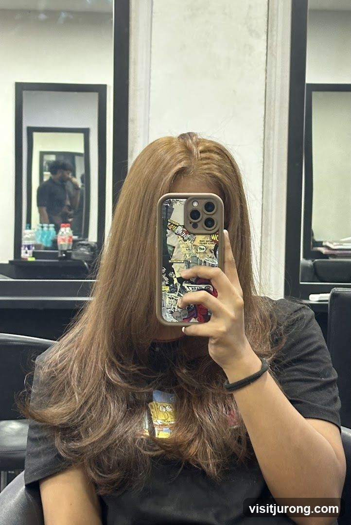 Woman taking a selfie in a salon