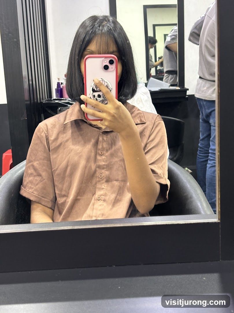 Woman taking a selfie in a salon