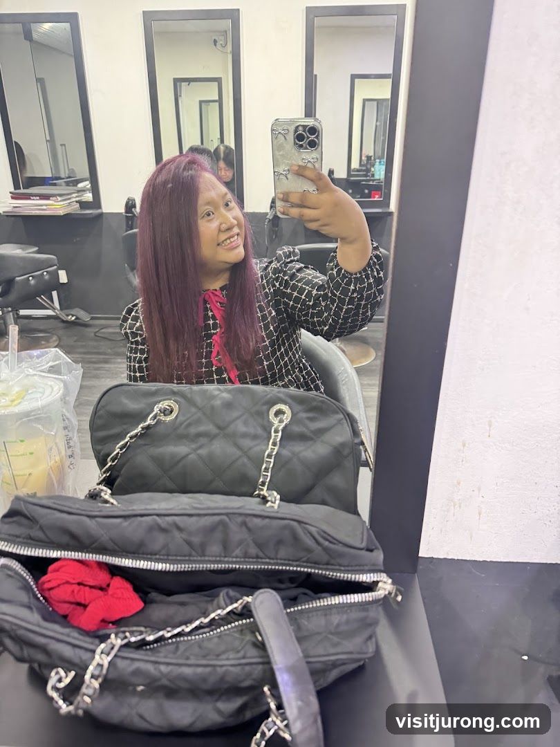 Woman taking a selfie in a salon