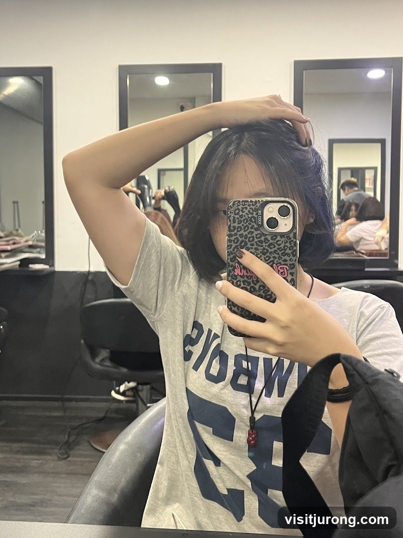 Woman taking a selfie in a salon