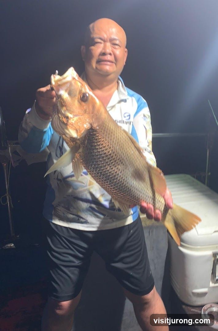 Man holding a large fish