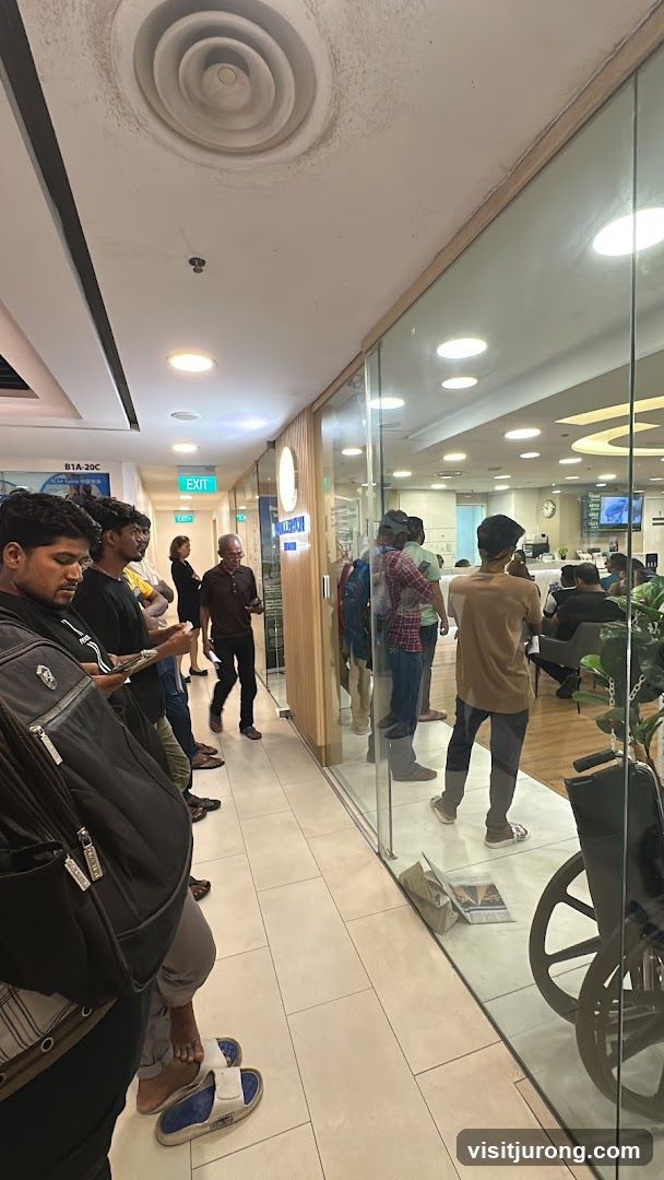 People waiting in a hallway