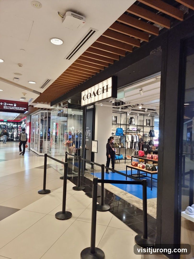 Coach IMM (Outlet)