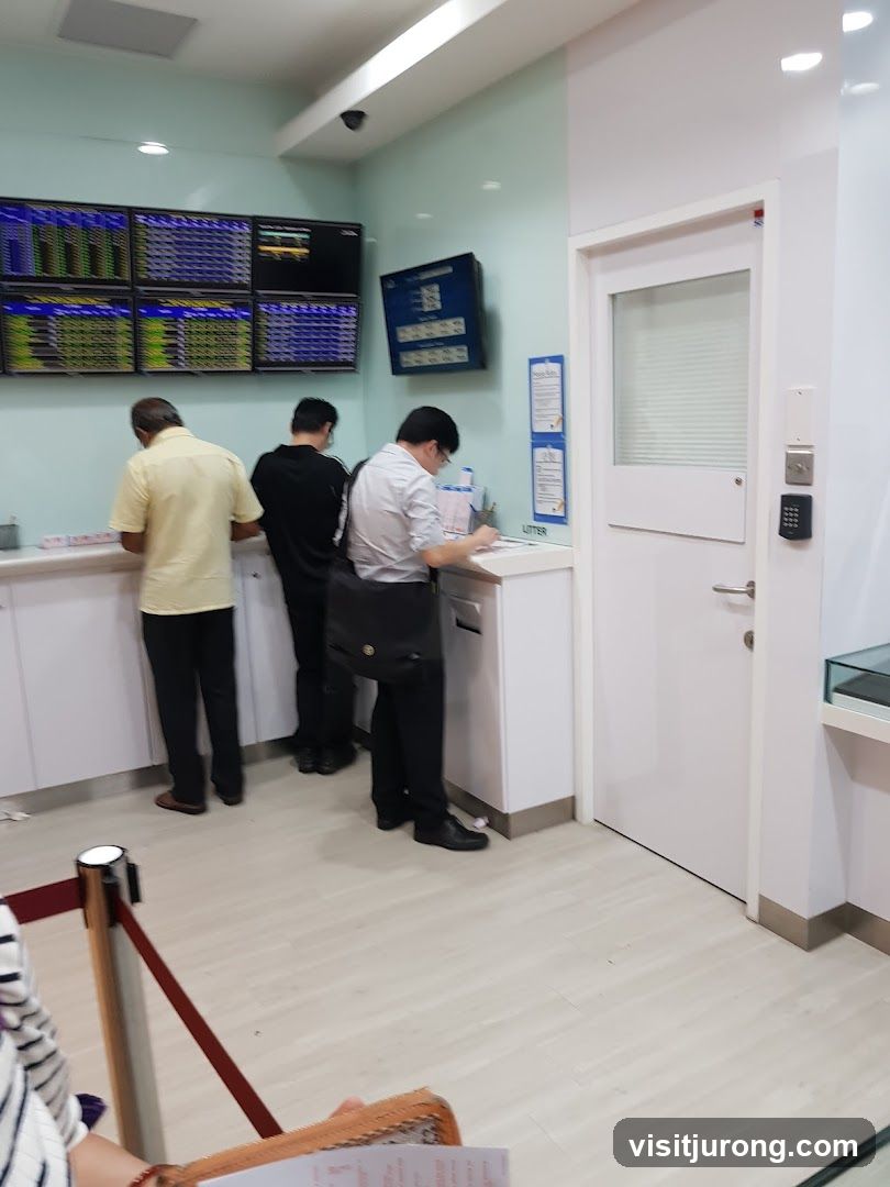 People at a counter with screens