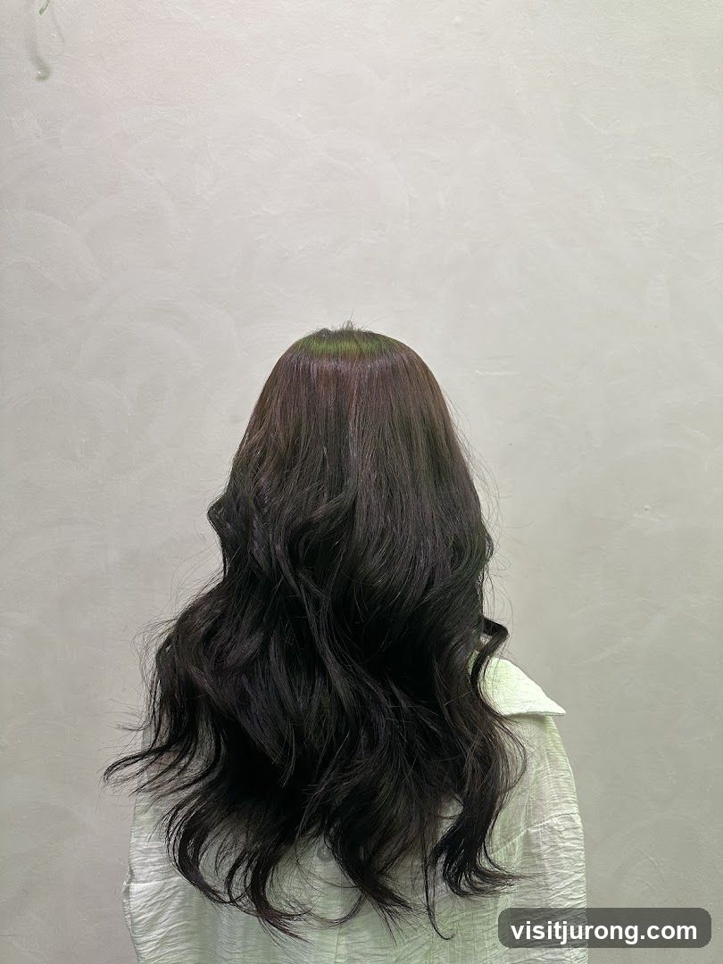 Woman with dark wavy hair
