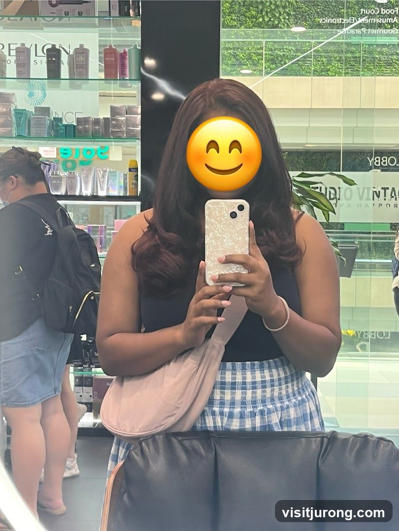 Woman Taking Mirror Selfie in Salon