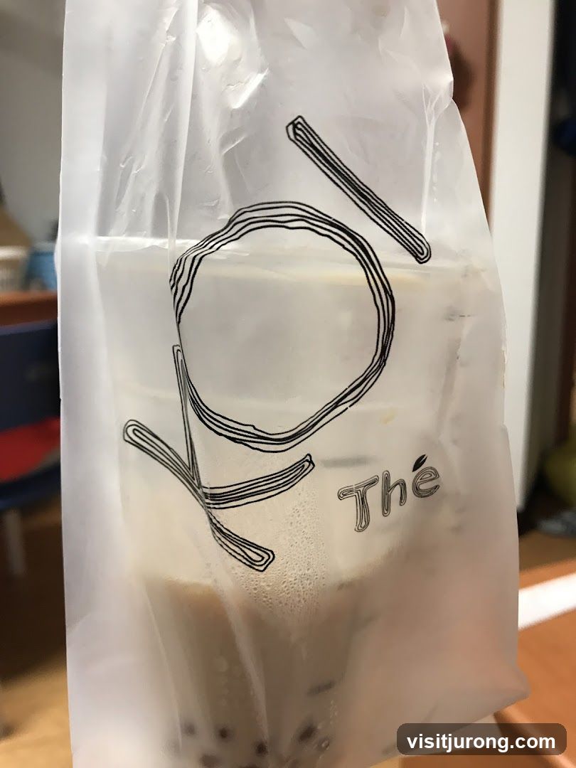 Beverage in branded bag