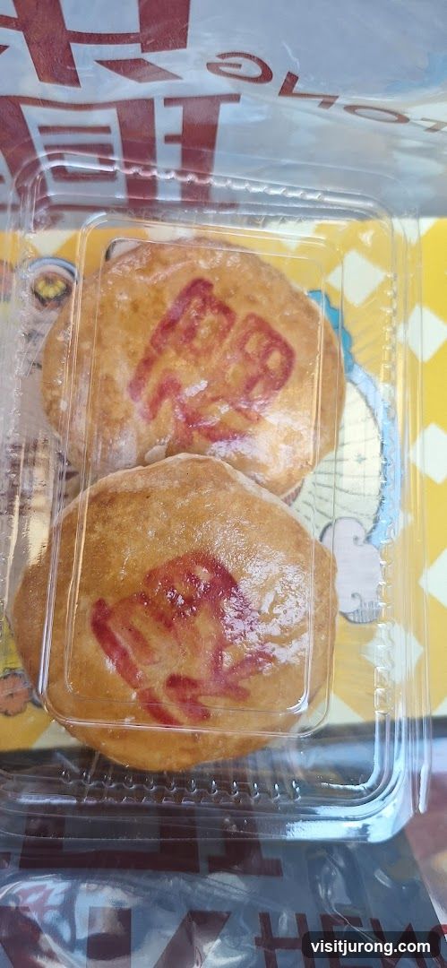Two Pastries in a Container