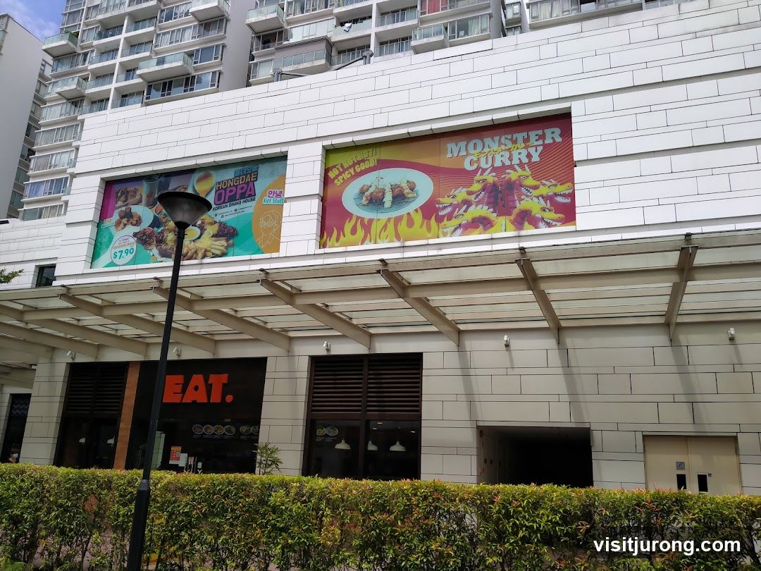 Restaurant Facade with Advertisements