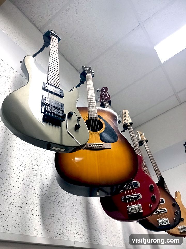 Guitars hanging from ceiling